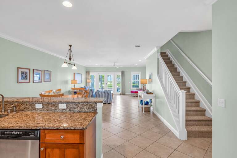 Fully equipped luxury kitchen overlooking the waterfront canal in a premium Marathon Florida vacation home — ideal for extended stays and families.