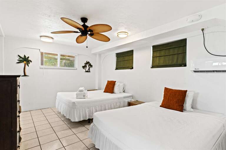 1st Level Bedroom 3 with 2 full sized beds and 2 twin sized beds