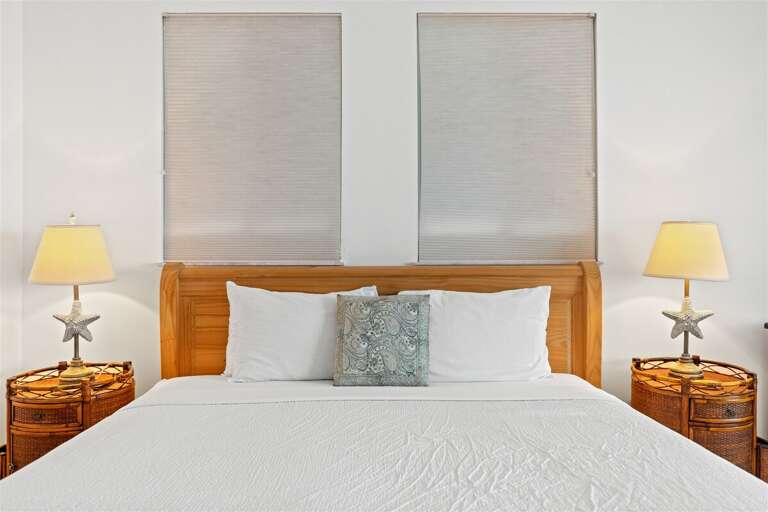 Bedroom 2 on the 2nd level with a king bed.