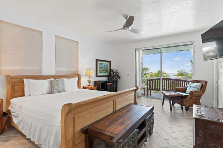 Bedroom 2 on the 2nd level with a king bed.