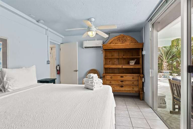 Bedroom 3 on the 1st level with a king bed.