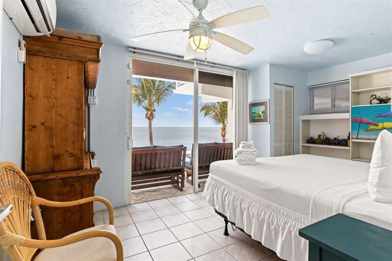 Bedroom 3 on the 1st level with a king bed.