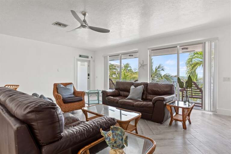 Living area adjacent to huge windows.