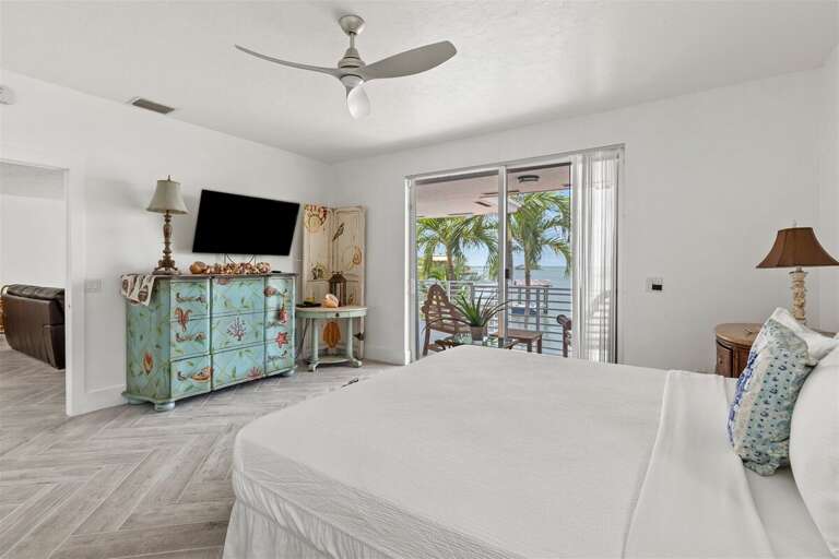 Master suite on the 2nd level with a king bed and ensuite bath.