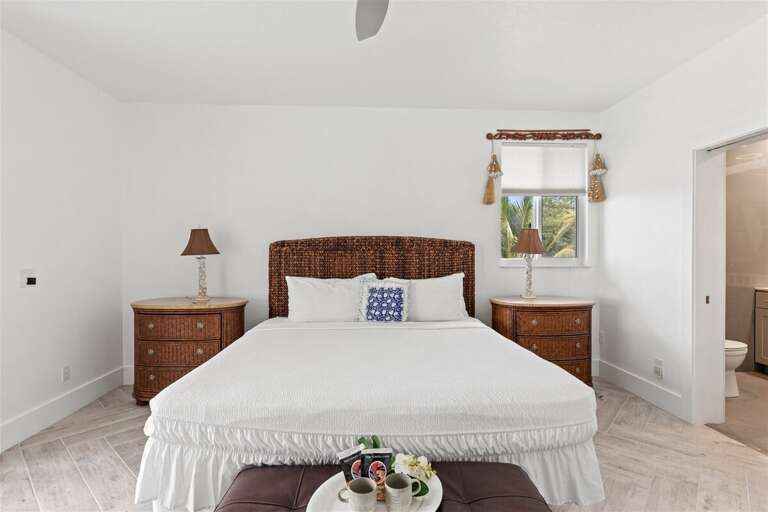 Master suite on the 2nd level with a king bed and ensuite bath.