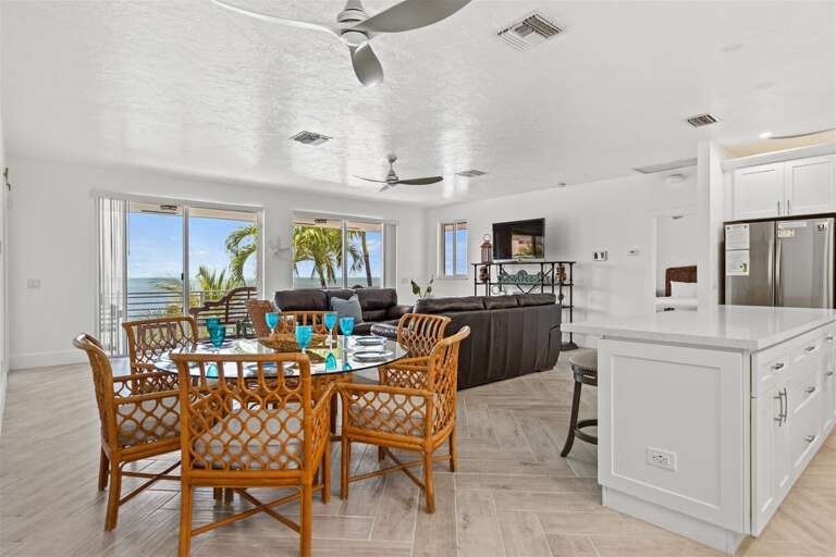 Open concept dining, living and kitchen area.