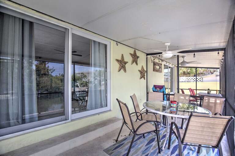 Enjoy the breeze in our screened-in lanai.
