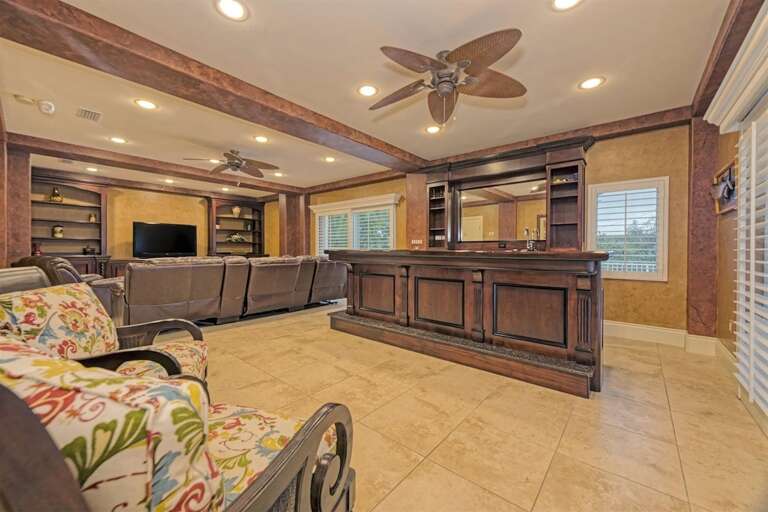 1st level theatre room and indoor bar.