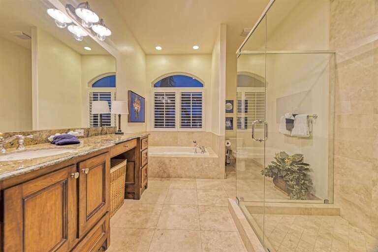 Master bathroom with separate bathtub and shower.