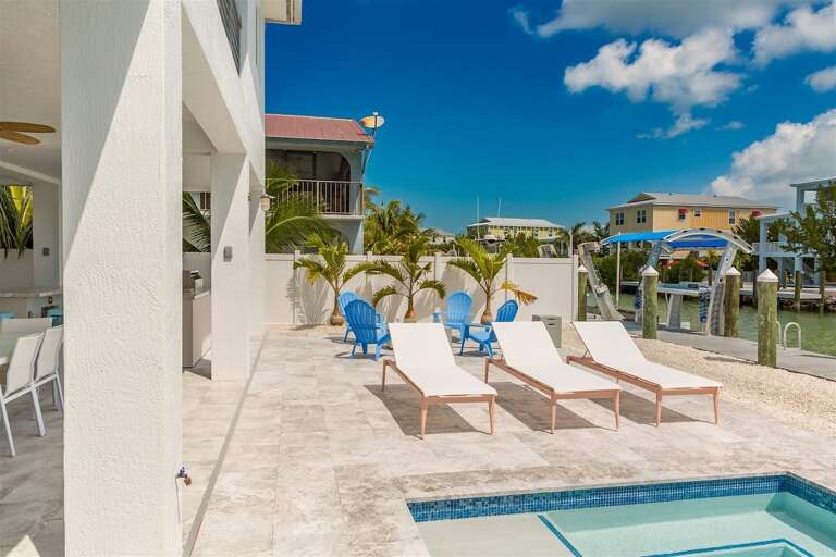 Lounge chairs by the pool.