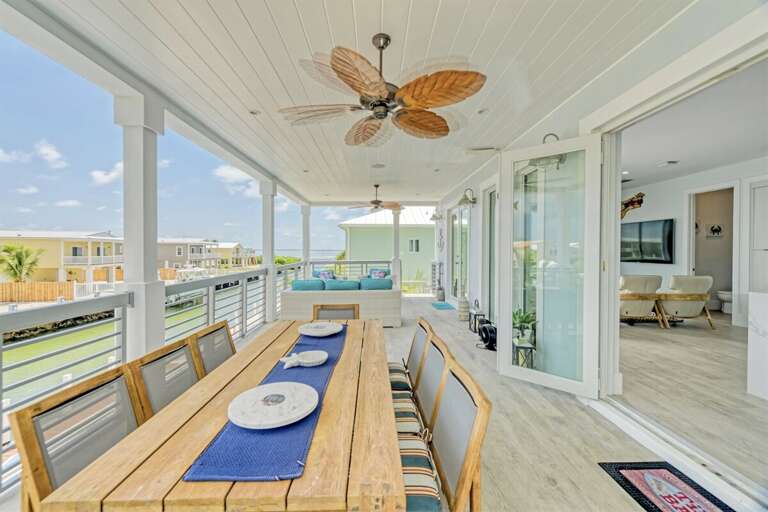 1st level balcony dining table seats 8.