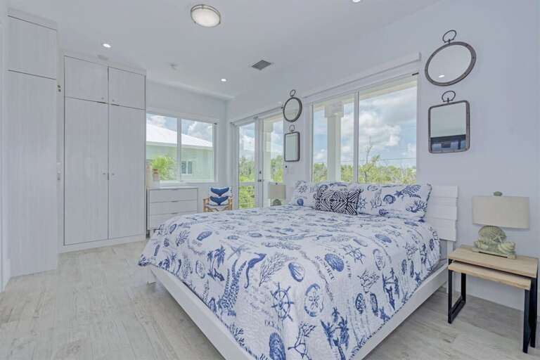 1st level master suite 1 with a King bed.