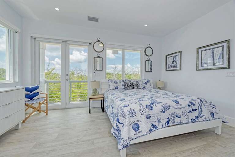 1st level master suite 1 with a King bed.