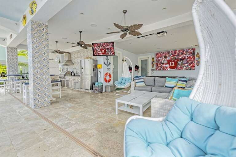 Outdoor recreation area with a full kitchen.