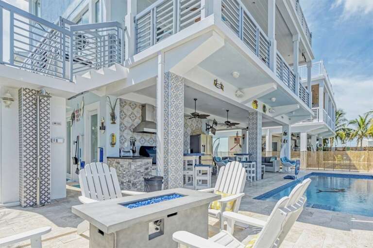 Outdoor recreation area with a full kitchen.