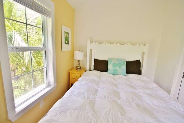 Bedroom 2 with a queen bed on the 2nd level.