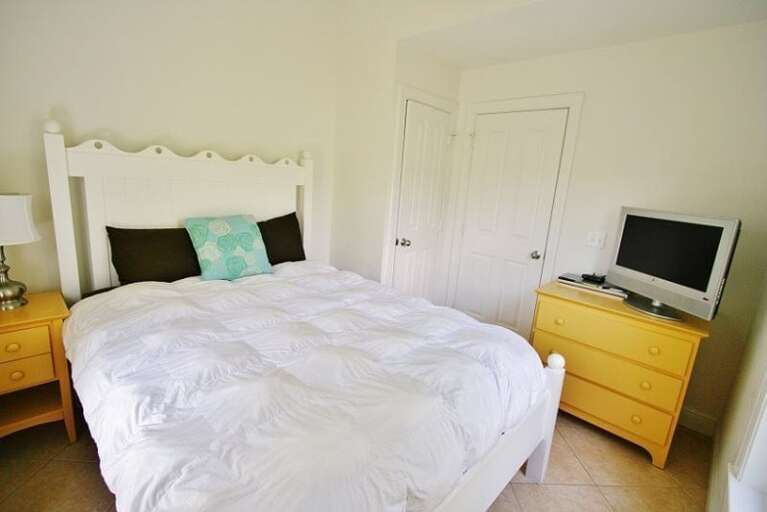 Bedroom 2 with a queen bed on the 2nd level.