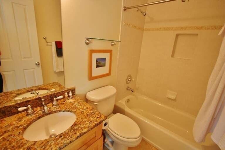 Shared full hallway bathroom.