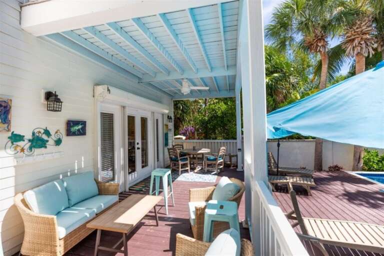 The backyard with plenty of seating.