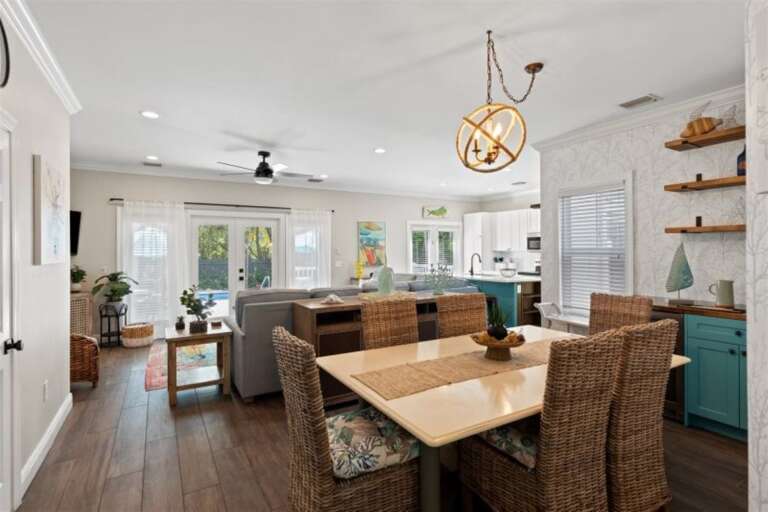 Open concept living area that looks over the pool.