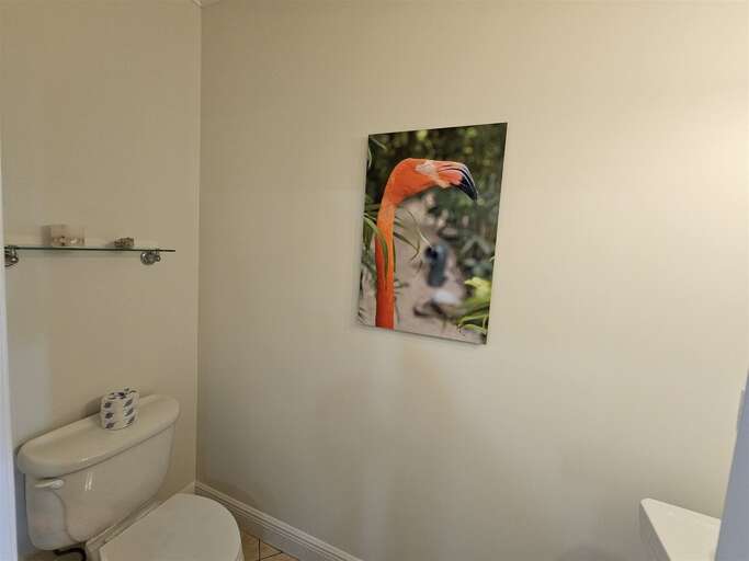 Half bathroom on the first level. Half bathroom on the first level.