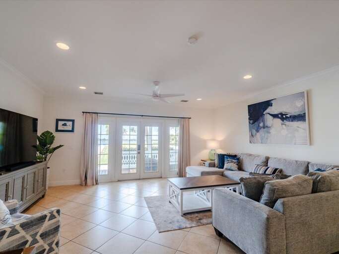 Living room - 75 smart TV, soundbar, HD cable TV, and large sectional sofa.