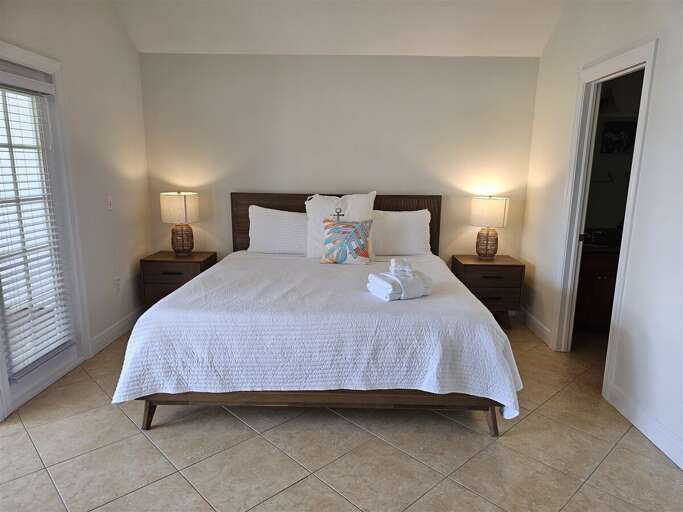 Master suite with a king bed. Master suite with a king bed.