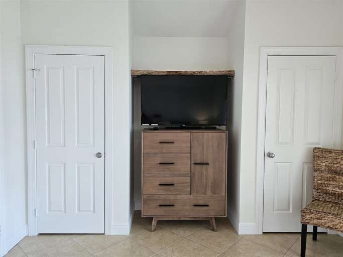 Smart TV in the master suite.