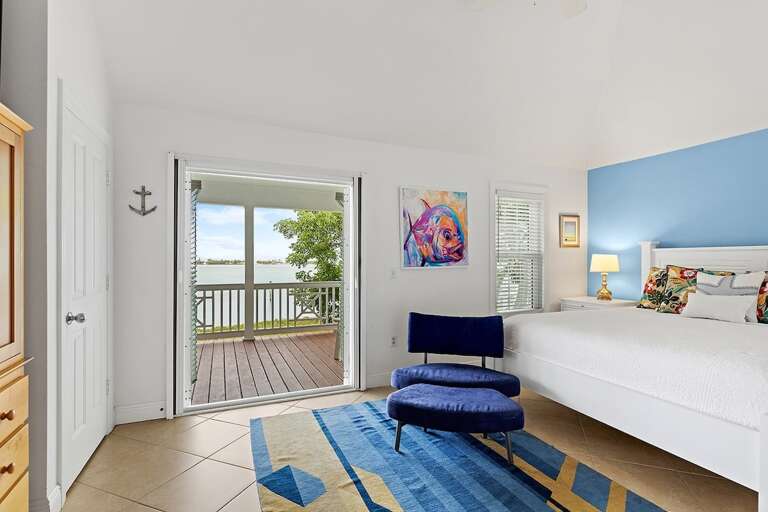 King bed in the 2nd level master bedroom with private porch.