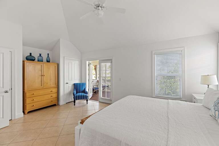 The master suite with a king size bed and en-suite bathroom.