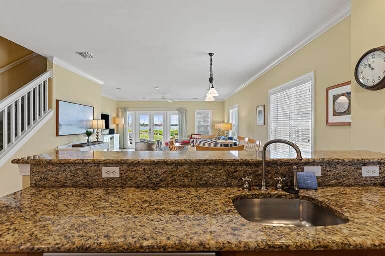 A seamless blend of living, dining, and kitchen spaces, perfect for creating unforgettable memories together.