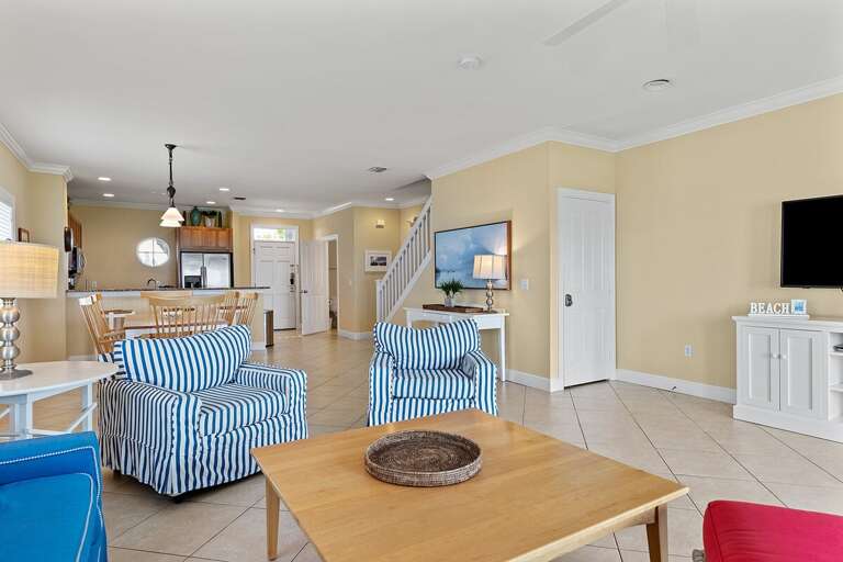 A seamless blend of living, dining, and kitchen spaces, perfect for creating unforgettable memories together.