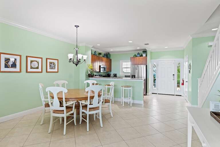 A seamless blend of living, dining, and kitchen spaces, perfect for creating unforgettable memories together. A seamless blend of living, dining, and kitchen spaces, perfect for creating unforgettable memories together.