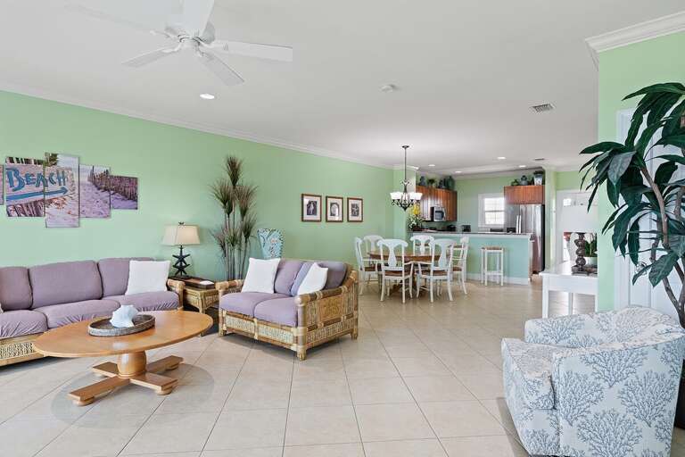 A seamless blend of living, dining, and kitchen spaces, perfect for creating unforgettable memories together. A seamless blend of living, dining, and kitchen spaces, perfect for creating unforgettable memories together.