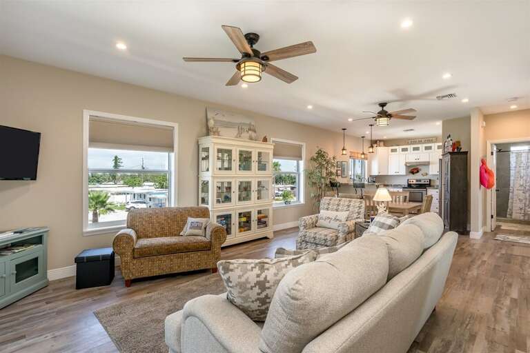 Open-concept dining area, living area and full kitchen. Open-concept dining area, living area and full kitchen.