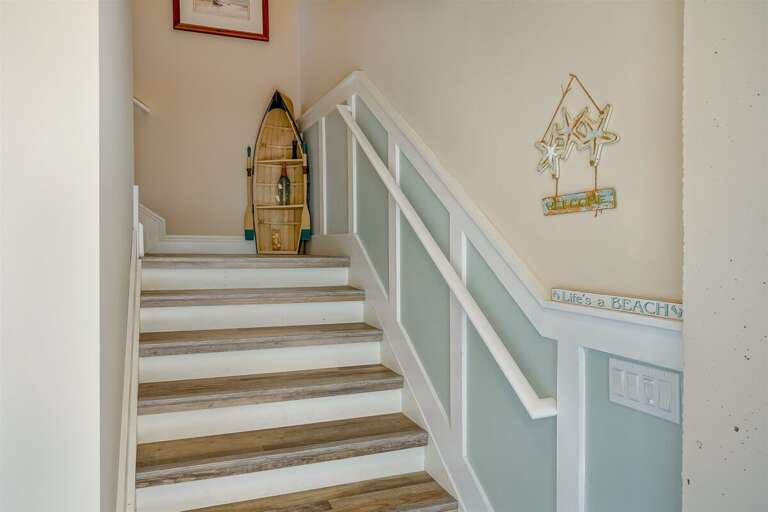 Stairs up to the main level. Stairs up to the main level.