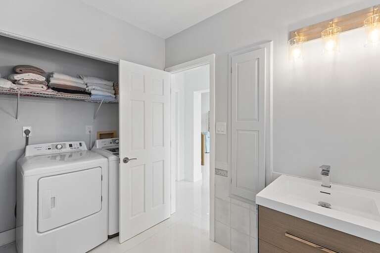 1st floor hallway full bathroom & laundry.