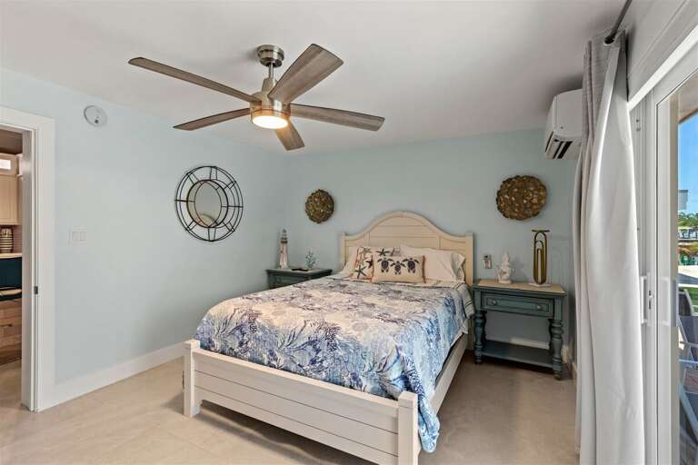 The 2nd bedroom with a queen sized bed.