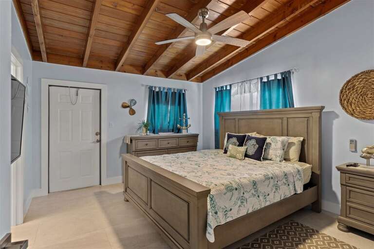 The master suite with a king bed.