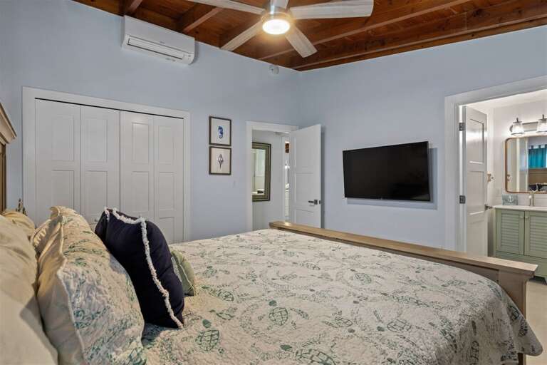 The master suite with a king bed