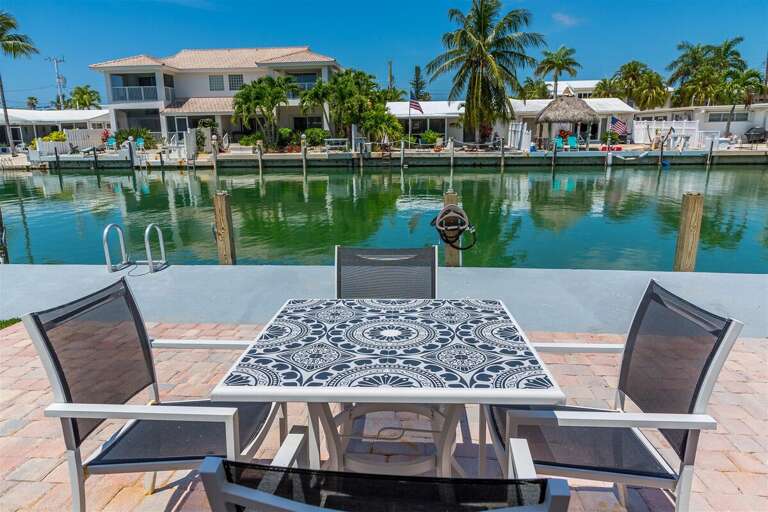 Outdoor seating next to the water.