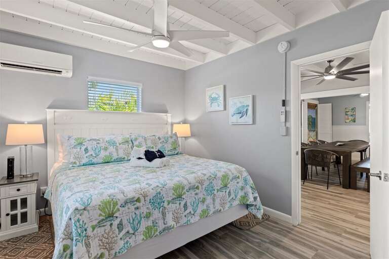 The master suite with a king bed, and a smart TV.