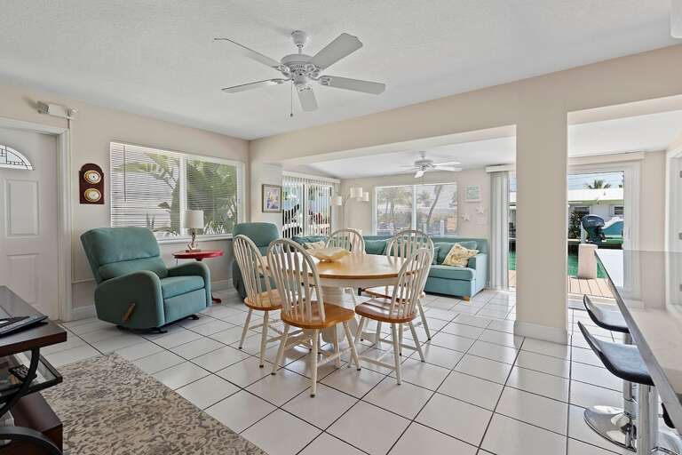 Plenty of seating to lounge in the living room, or enjoy meals with friends and family in the dining area.