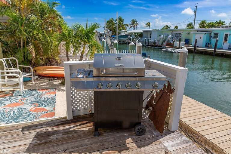 Grill with a view: Enjoy waterside dining with this backyard barbecue spot.