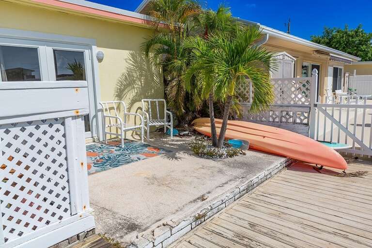 Inviting backyard seating area, perfect for relaxation and outdoor gatherings.