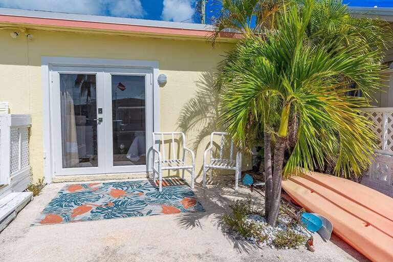 Inviting backyard seating area, perfect for relaxation and outdoor gatherings.