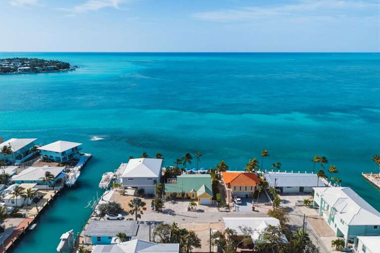 Drone shot highlighting the prime oceanfront location of this Marathon vacation home.