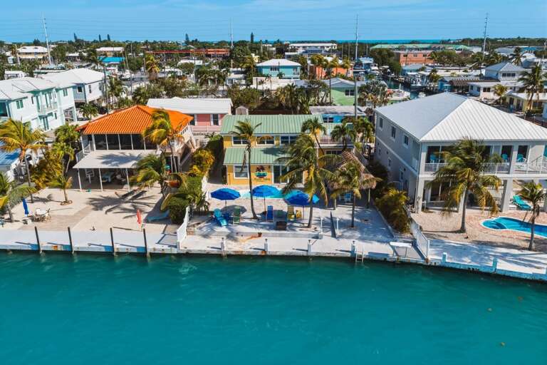 Private 50-foot dock with deep water access, ideal for boating and fishing directly from this oceanfront Marathon home.