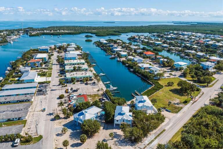 This aerial view showcases your private pool and canal front dock, highlighting the perfect combination of relaxation and adventure in Marathon FL.