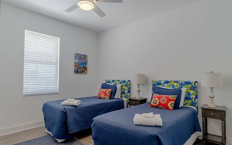 Two of two double twin bedroom with smart TV on the 2nd level.